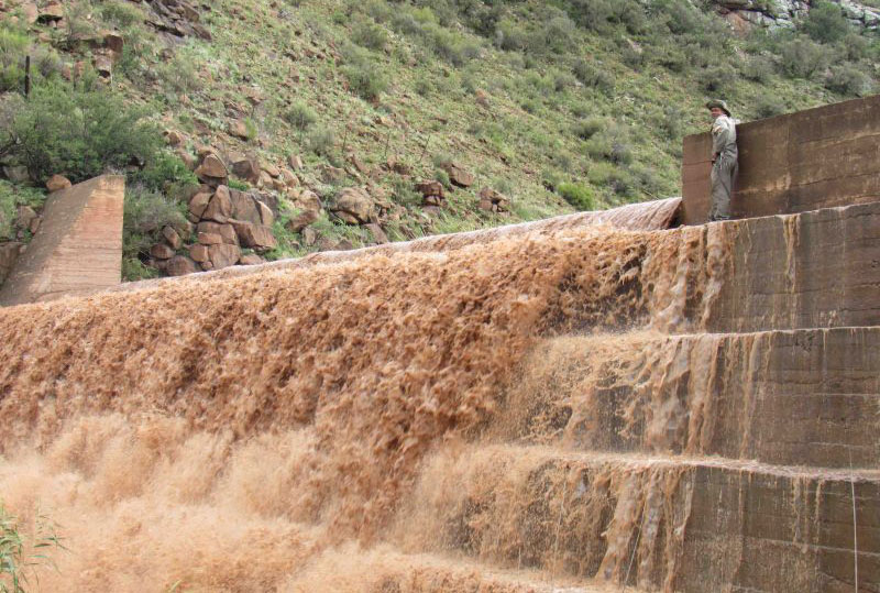 running water over dam wall