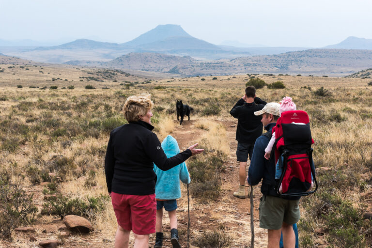 family of people walking hiking in karoo experience activity
