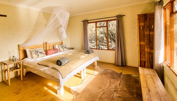 karoo eco river lodge bedroom two double beds together