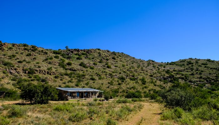 karoo eco river lodge accommodation exterior against blue skies
